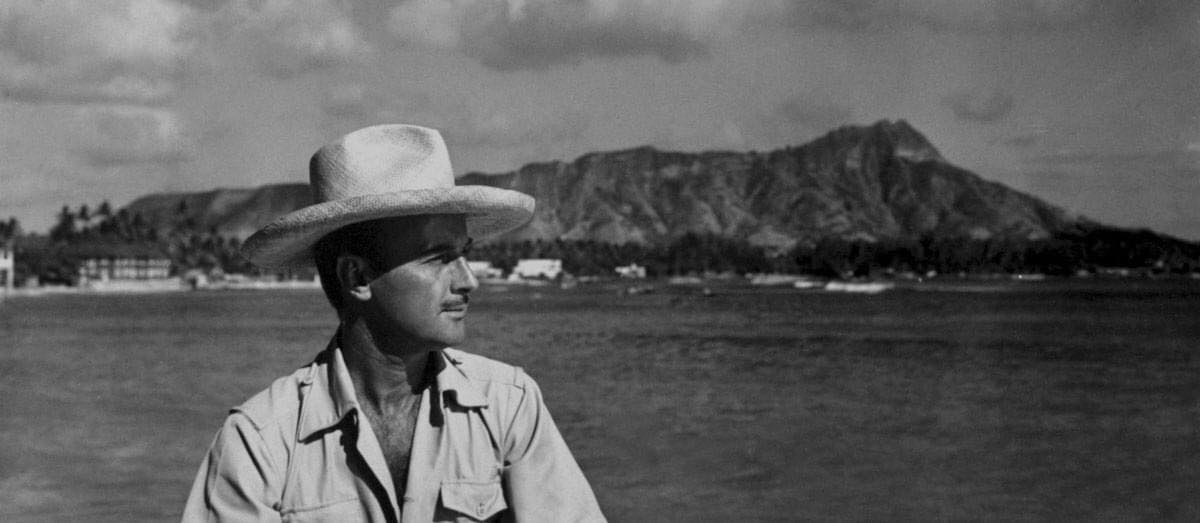 Donn Beach on the water in Waikiki with Diamond Head in the background